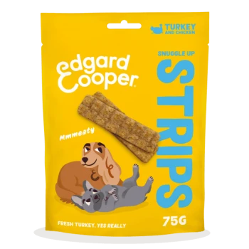 Verpackung der Edgard Cooper Snuggle Up Strips mit zwei Streifen, verspieltem Hund und Katze sowie dem Text "Mmmeaty" und "FRISCHER PUTENFLEISCH, JA WIRKLICH."