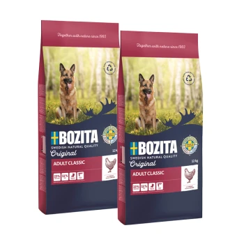 Zwei Beutel Bozita Hundefutter, beschriftet mit 'Original Adult Classic', mit einem Deutschen Schäferhund im Waldhintergrund. Jeder Beutel wiegt 12 kg.
