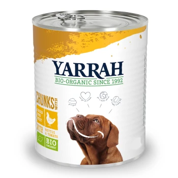 Organic Adult 12x405 g kip Blik Yarrah bio-organisch hondenvoer met stukjes kip, brandnetel en tomaat. Afbeelding toont een bruine hond met een speelse uitdrukking.