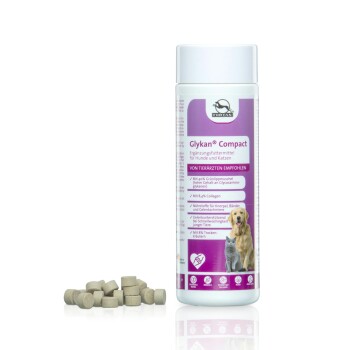 Glykan® Compact Ergänzung für Hunde und Katzen, mit einer weißen Flasche mit lila Akzenten, neben kleinen grauen Tabletten.