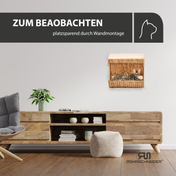 Ein gemütliches wandmontiertes Katzenbett mit einer schlafenden getigerten Katze, begleitet von dem Text "ZUM BEAOBAchten platzsparend durch Wandmontage."