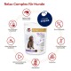 Verpakking van Relax Complex voor honden met een bruine hond, die voordelen benadrukt zoals een hoog vleesgehalte, door dierenartsen ontwikkelde formule en smakelijke kauwproducten.