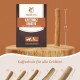 Wildfang Kaffeebaum-Kaustab-Paket auf einer Holzoberfläche, beschriftet mit "Kaffeholz Kaustab" für Hunde von 25-45 kg, chemiefrei.