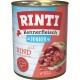 Dosen-Hundefutter mit der Aufschrift "RINTI Kennerfleisch Junior" mit Rindfleisch, getreidefrei, mit Fleischstücken und einem Hinweis "Reich an Omega 3."