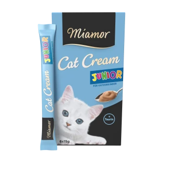 Miamor Cat Cream Junior Verpackung mit einem süßen weißen Kätzchen mit blauen Augen, einem Löffel Sahne und dem Text " + Taurin".