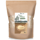 Ein 1-kg-Beutel REAVET Reisflocken für Haustiere, mit einer Wolfsgrafik, mit dem Text "Reis Flocken" und "schonend getrocknet" in Grün.