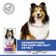 Sheltie-Hund neben Hill's Science Plan Sensitive Stomach & Skin Hundefutterbeutel mit dem Text "Unterstützung von Darm und Haut ab Tag 1".