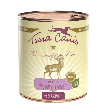 Eine Dose Terra Canis Hundefutter mit der Aufschrift "Wild", die Wildfleisch mit Kürbis, Amaranth und Cranberries enthält und 100% natürliche Zutaten betont.
