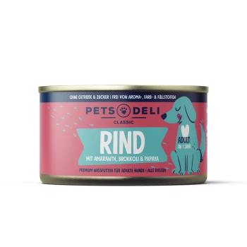 Nourriture pour chien en conserve étiquetée "RIND" avec de l'amarante, du brocoli et de la papaye. Présente un chien de dessin animé et un texte indiquant qu'elle est pour les chiens adultes.