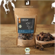 Kraftpapier-Tüte mit Aufschrift 'LIEBESGUT' und 'BIO‑RIND LUNGE' (Snack für Hunde & Katzen) mit BIO-Siegel und Haufen Rinderlungenwürfel.