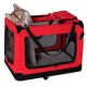 Eine rote tragbare Haustierbox mit Netzseiten, mit einem verspielten Hund, der von oben herausblickt, und einer gepolsterten Matte im Inneren.