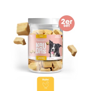 Hundeleckerlis in einem transparenten Glas mit dem Etikett "KAUDAS" mit einem pinken Rand, mit einem Border-Collie-Bild, 80g, Hühnergeschmack, hergestellt in Deutschland.