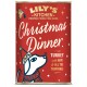 Can of Lily's Kitchen Christmas Dinner dog food, turkey with ham and trimmings, red label with dog wearing winter hat and scarf.