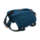 Blauer Hunderrucksack mit verstellbaren Riemen und einem oberen Griff, mit dem Logo "RUFFWEAR" an der Seite.