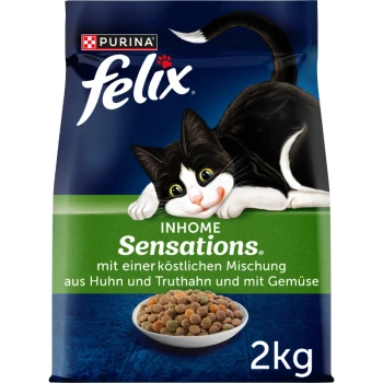 Torba z karmą dla kotów Purina Felix z zabawnym czarno-białym kotem, oznaczona "INHOME Sensations" z kurczakiem, indykiem i warzywami, 2kg.