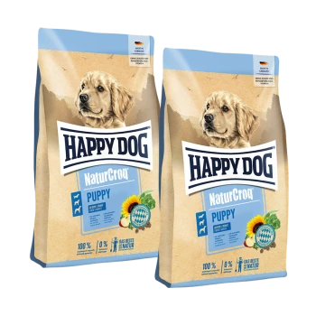 Zwei Beutel Happy Dog NaturCroq Puppy Hundefutter mit einem Golden Retriever Welpen und Sonnenblumengrafiken.