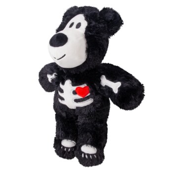 Black plush dog toy with white skull ribs and red heart patch, white face and bone arm detail