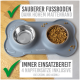 Futtermatte für Haustiere mit zwei Edelstahlschalen, mit Text über Sauberkeit und enthaltenen Schalen-Einsätzen.