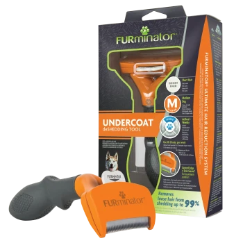 FURminator Undercoat deShedding Tool (orange, M) für mittelgroße kurzhaarige Hunde in Verkaufsverpackung, „Entfernt bis zu 99 %“.