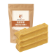 Hundekau-Sticks von Wildfang, beschriftet mit "Hartkäse Kaustab Bunky", mit vier gelben Sticks vor einer braunen Verpackung.