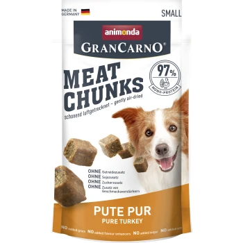 Emballage de nourriture pour chien GranCarno Meat Chunks d'Allemagne, mettant en avant un chien souriant et un texte soulignant "97% mono-protéine" et "Dinde Pure."