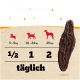 Fütterungsempfehlungstabelle für Hundeleckereien, die Portionsgrößen zeigt: ½ für 5-9 kg, 1 für 10-24 kg und 2 für 25 kg+, mit 'täglich' vermerkt.