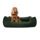 Grünes Corduroy-Hundebett mit erhöhten Rändern und einem plüschigen Innenraum, entworfen für Komfort und Stil.