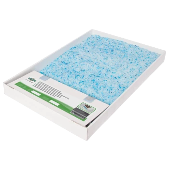 Blaue Kristall-Katzenstreu in einer weißen Box, mit einem grünen und weißen Etikett mit Produktinformationen und Anwendungshinweisen.