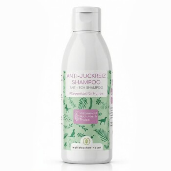 Flasche mit Anti-Juckreiz-Shampoo für Hunde, beschriftet mit "ANTI-JUCKREIZ SHAMPOO", mit Lavendel- und Kräuterillustrationen.