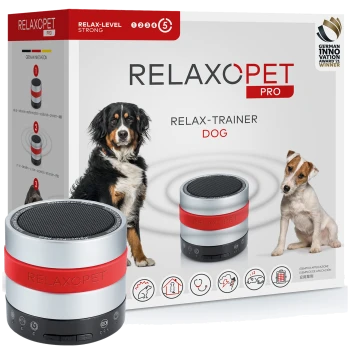 RelaxoPet Pro Entspannungstrainer für Hunde, mit einem kompakten Lautsprecherdesign mit roten Akzenten, neben Bildern eines Hundes und eines Welpen.