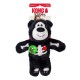 Black plush KONG Wild Knots bear toy with white skeleton, red heart and green FEEL ME! sticker.