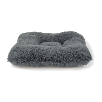 Graues plüschiges Haustierbett mit einer flauschigen Textur und tufted Design, ideal um Komfort für Haustiere zu bieten.