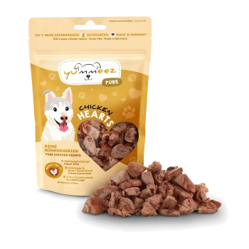 Zamykana żółta torba przysmaków dla psów Yummeez Pure Chicken Hearts z oknem w kształcie serca, z ilustracją psa i kluczowymi etykietami.