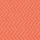 Ein strukturierter Stoff in Korallenfarbe mit einem sich wiederholenden Fischgrätenmuster.