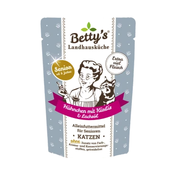 Betty's Landhausküche Katzenfutter für Senioren: "Hühnchen mit Kürbis & Lachsöl," behauptet "Extra viel Fleisch," keine künstlichen Zusatzstoffe.