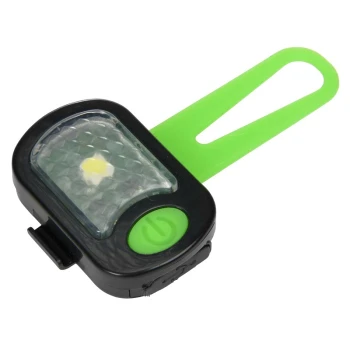 Schwarzes und grünes Haustiersicherheitslicht mit einem diamantmusternden Objektiv und einem grünen Riemen zur Befestigung.