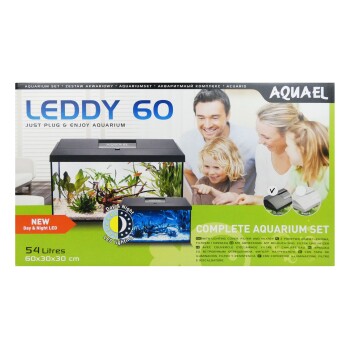 AQUAEL Leddy 60 aquarium set displayed in a colorful box, featuring a 54-litre tank with plants, LED lighting, and family members in the background.