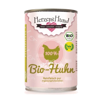 Dose mit HerzensHund Bio-Hühnchen-Hundefutter, beschriftet mit '100% Bio-Huhn', mit einem rosa Hintergrund und Nährwertangaben.
