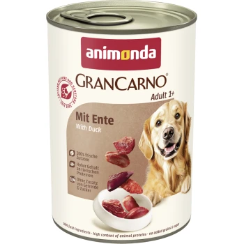 Dose Animonda GranCarno Adult 1+ Hundefutter mit Ente, zeigt einen glücklichen Golden Retriever und Fleischstücke in einer Schüssel.