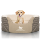 Ein gemütliches Hundebett mit einem weichen, plüschigen Innenraum und einem stilvollen Äußeren, mit dem Markennamen "KNUFFELWUFF" deutlich sichtbar.