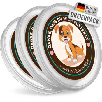 Drei Haustierfutterschalen mit einem glücklichen Cartoonhund, deutschem Text "Danke, dass du mich fütterst," und einem "3er SET" Etikett.