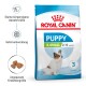 Royal Canin Puppy X-Small Hundefutterbeutel, geeignet für Welpen im Alter von 2-10 Monaten, mit einer Illustration eines kleinen Hundes und ernährungsphysiologischen Vorteilen.