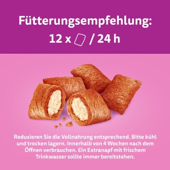 Fütterungsempfehlung für Haustierfutter: 12 Stück pro 24 Stunden. Das Bild zeigt knusprige Leckereien mit einer cremigen Füllung auf einem rosa Hintergrund.