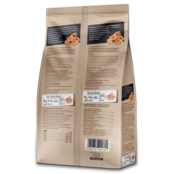 Verpackung für Hundefutter mit einer getreidefreien Formel mit Huhn und Lamm, Nährwertinformationen und Fütterungshinweisen.