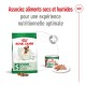 Emballage de nourriture pour chien Royal Canin mini avec une image de beagle, promouvant un mélange de nourriture sèche et humide pour une nutrition optimale.