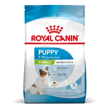 Royal Canin PUPPY X-SMALL Hundefutterbeutel — 2–10 Monate, Erwachsenengewicht bis zu 4 kg, Bild eines kleinen weiß-braunen Welpen.