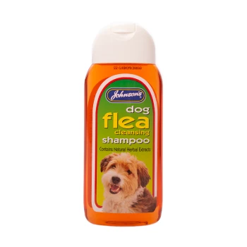 Johnson's dog flea cleansing shampoo bottle, orange with green label, stating "Contains Natural Herbal Extracts."