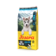 Josera Junior proteinreiches, getreidefreies Hundefutter mit Meeresfisch, Verpackung mit Bergkulisse und Hundepfoten auf gelbem Hintergrund.