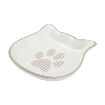 White ceramic pet dish shaped like a cat's face, featuring a brown checkered paw print design in the center.