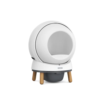 PetSafe moderne weiße automatische selbstreinigende Katzentoilette mit Holzbeinen und grauer Abfallbox.